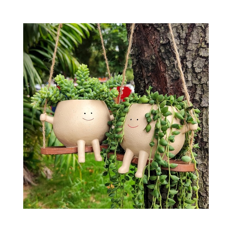 Cvetlični lonček NASMEJANA DEKLICA NA GUGALNICI