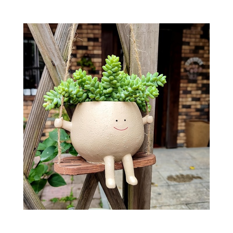 Cvetlični lonček NASMEJANA DEKLICA NA GUGALNICI